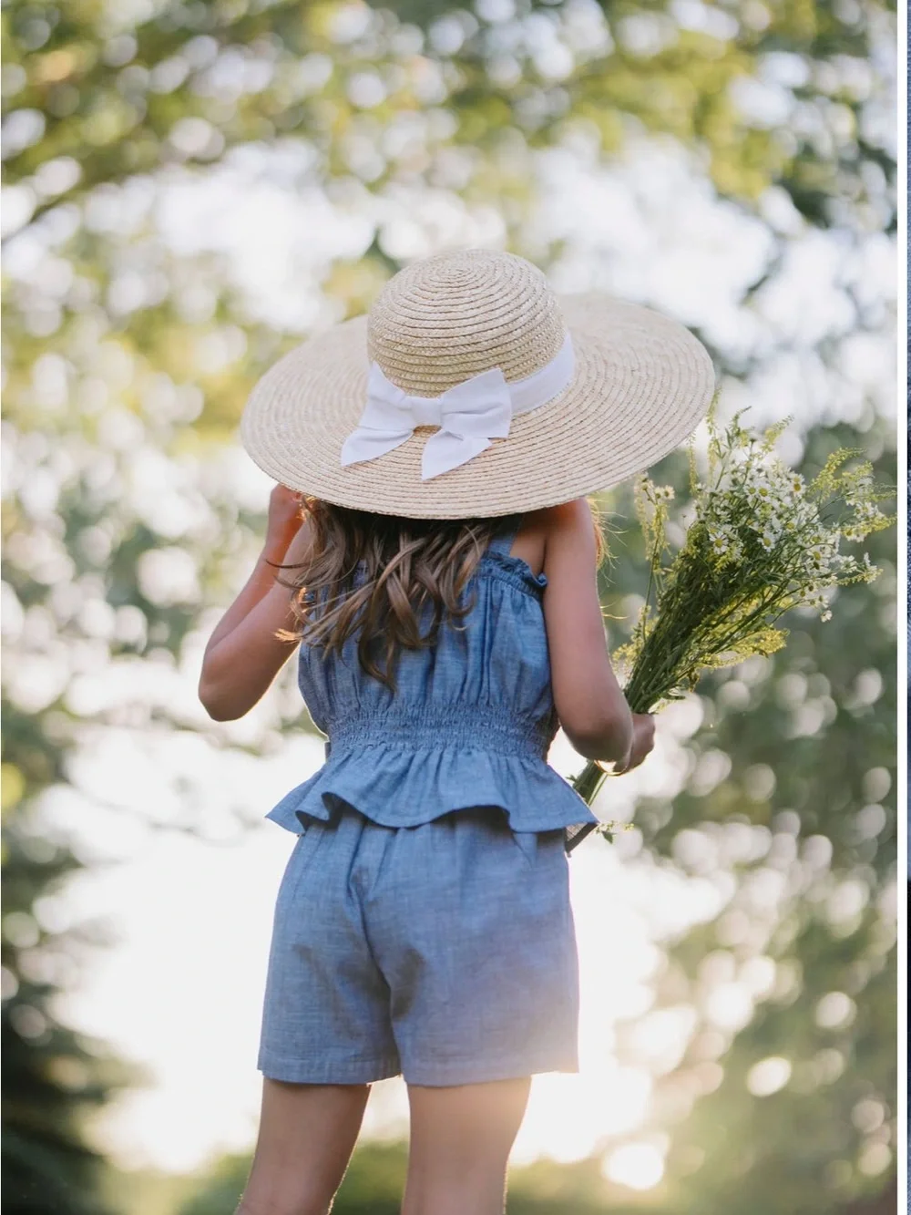 Toddler Blue Chambray Ruffle Romper with Bow